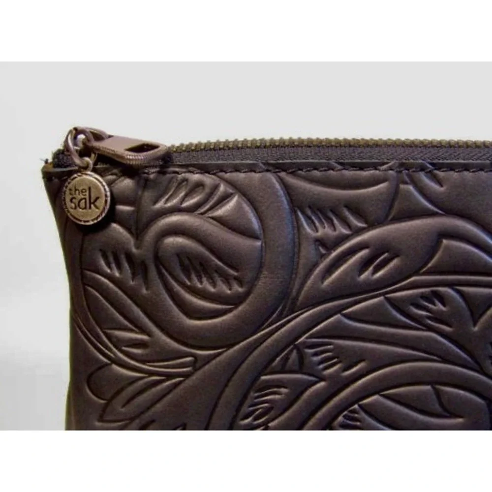 The Sak Cosmetic Clutch Embossed Black Like New